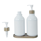 بطری لوسیون حمام سفید با پمپ بامبو برای شامپو و شستشوی بدن